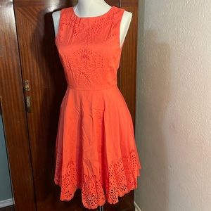 Sleeveless coral laser cut dress